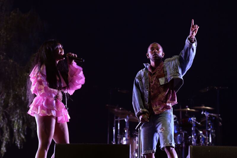 SZA and Kendrick Lamar performing