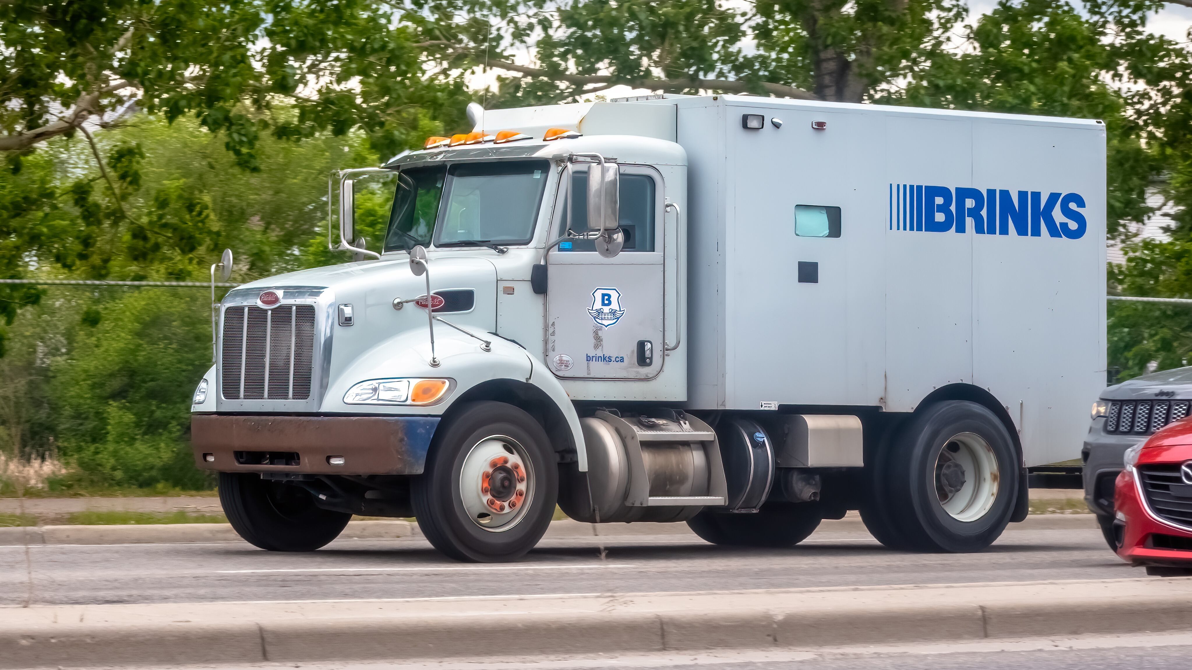 Brinks truck on the road. A cash-in-transit company.
