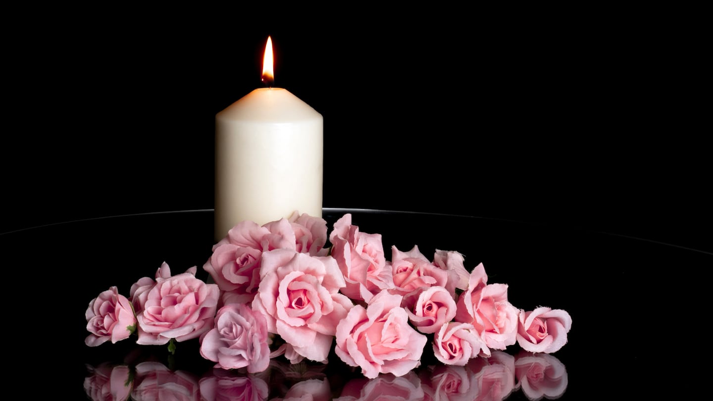 Candle, roses